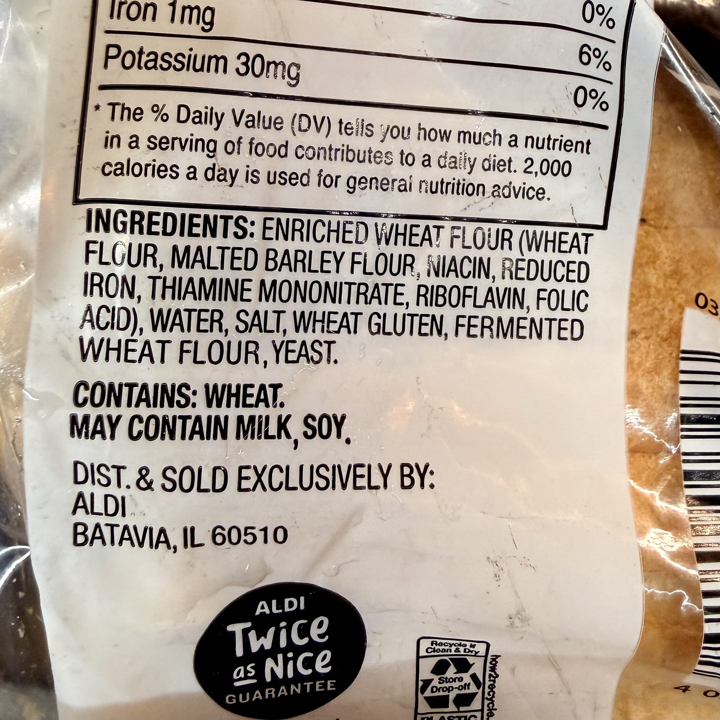 Back of the same loaf listing enriched flour, added wheat gluten, malted barley and yeast
